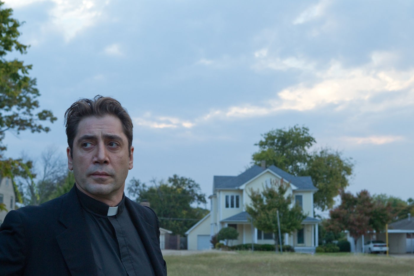 Javier Bardem as a priest
